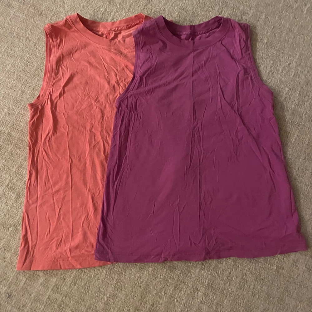Lulu Lemon All Yours Tank Tops (salmon color and purple).